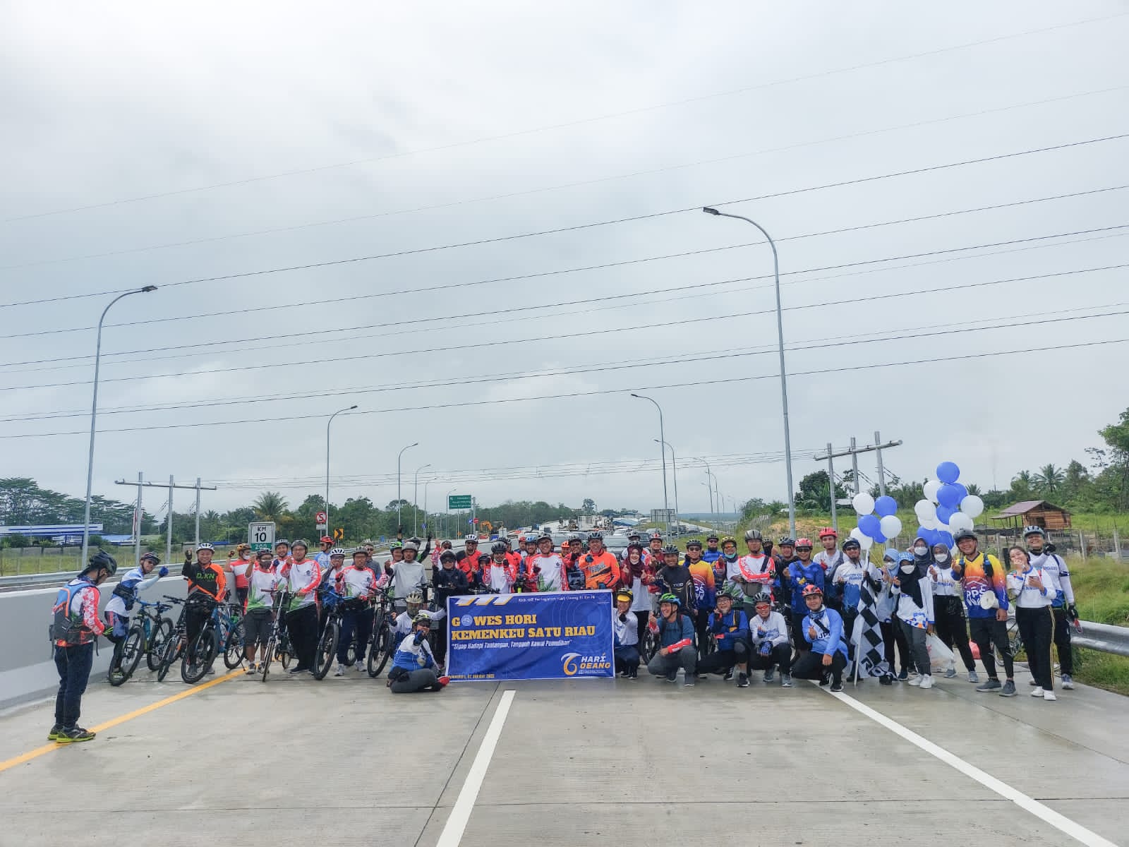 Kick Off HORI ke-76, Kemenkeu Riau Gowes di PSN Ruas Tol Pekanbaru – Bangkinang